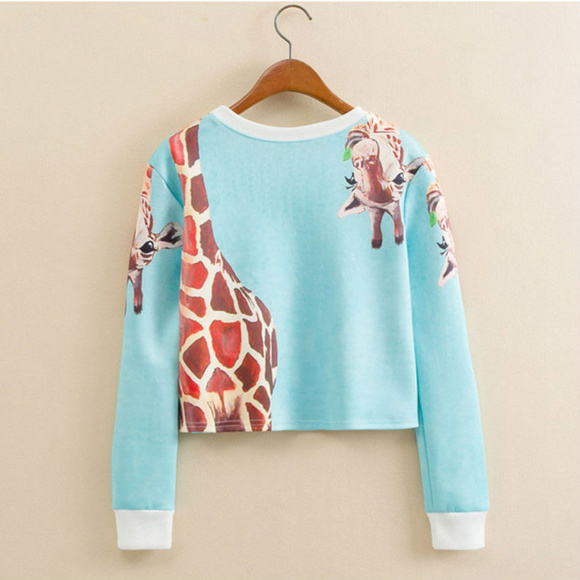 Tops - Short cropped sweater top with giraffe print NWOT